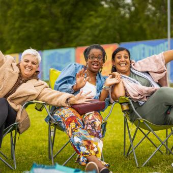 Women sitting in deck chairs
